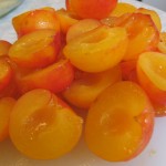 organic yellow plum halved